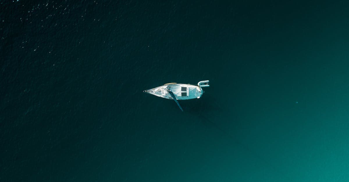 Vibrant boats floating on turquoise sea